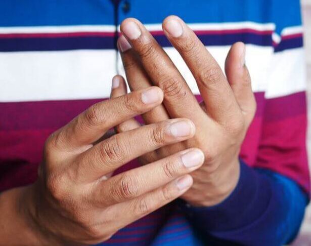Hand holding in pain arthritis